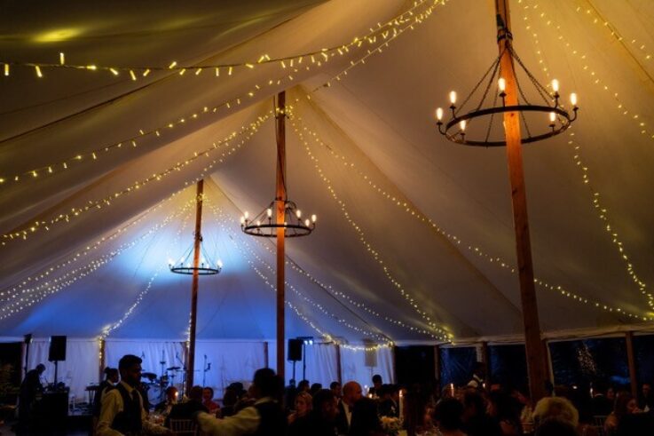 Traditional Canvas Marquee with Wrought Iron Chandelier and marquee fairy lighting